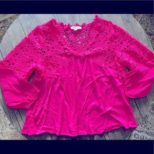 Stunning hot pink crochet-like top with crepe material.